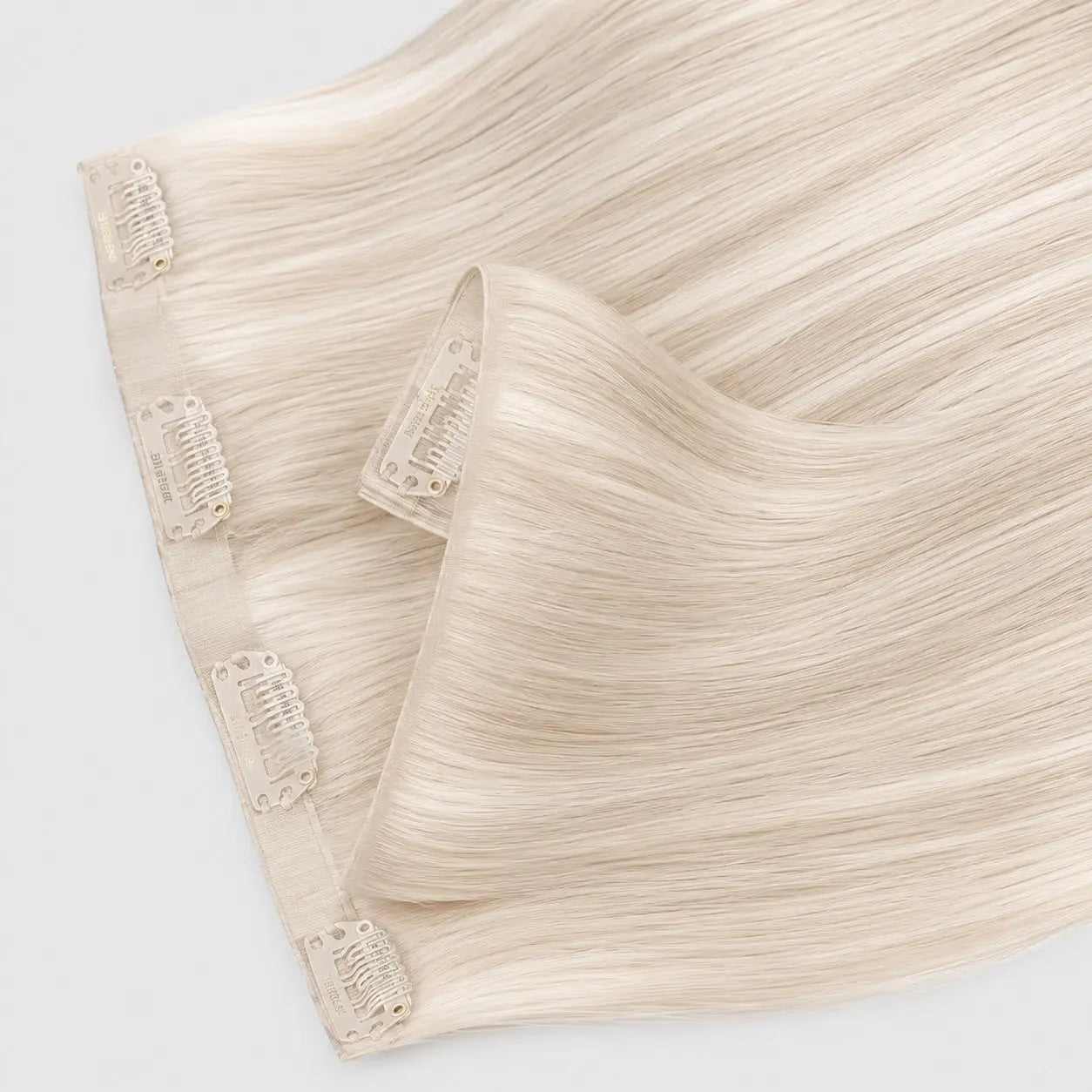 Invisible clip-in extensions 60A – Ljus Askblond Bsextensions