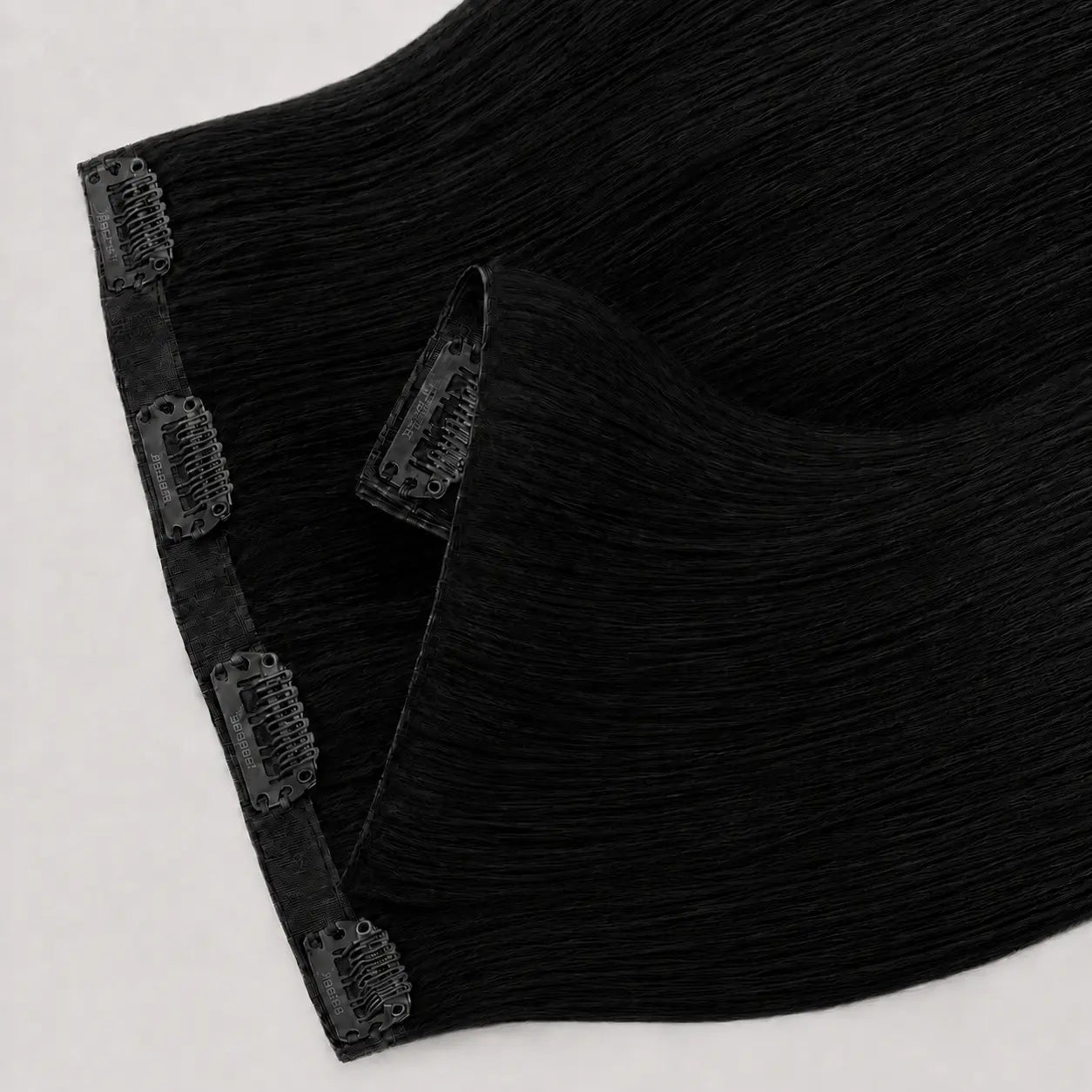 Invisible Clip-in extensions #1 – Jet Black Bsextensions